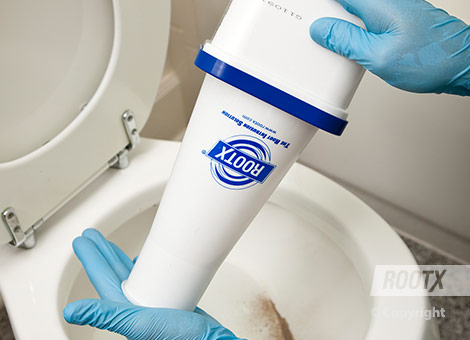 Step 3: Mix RootX Components

Grasp the bottom of the square container and the narrow end of the mixing funnel applicator (putting a gloved hand over the mixing funnel cap located at the narrow end of the mixing applicator). Rock the square container with the mixing funnel applicator attached, back and forth for approximately one minute—allowing the two dry components of RootX to flow into the funnel and back into the square container several times.
